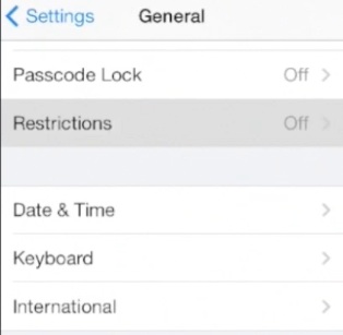 tapping Restrictions from home menu of iPhone running on iOS 7