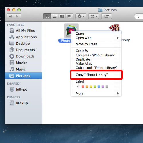 how to change iphoto library location